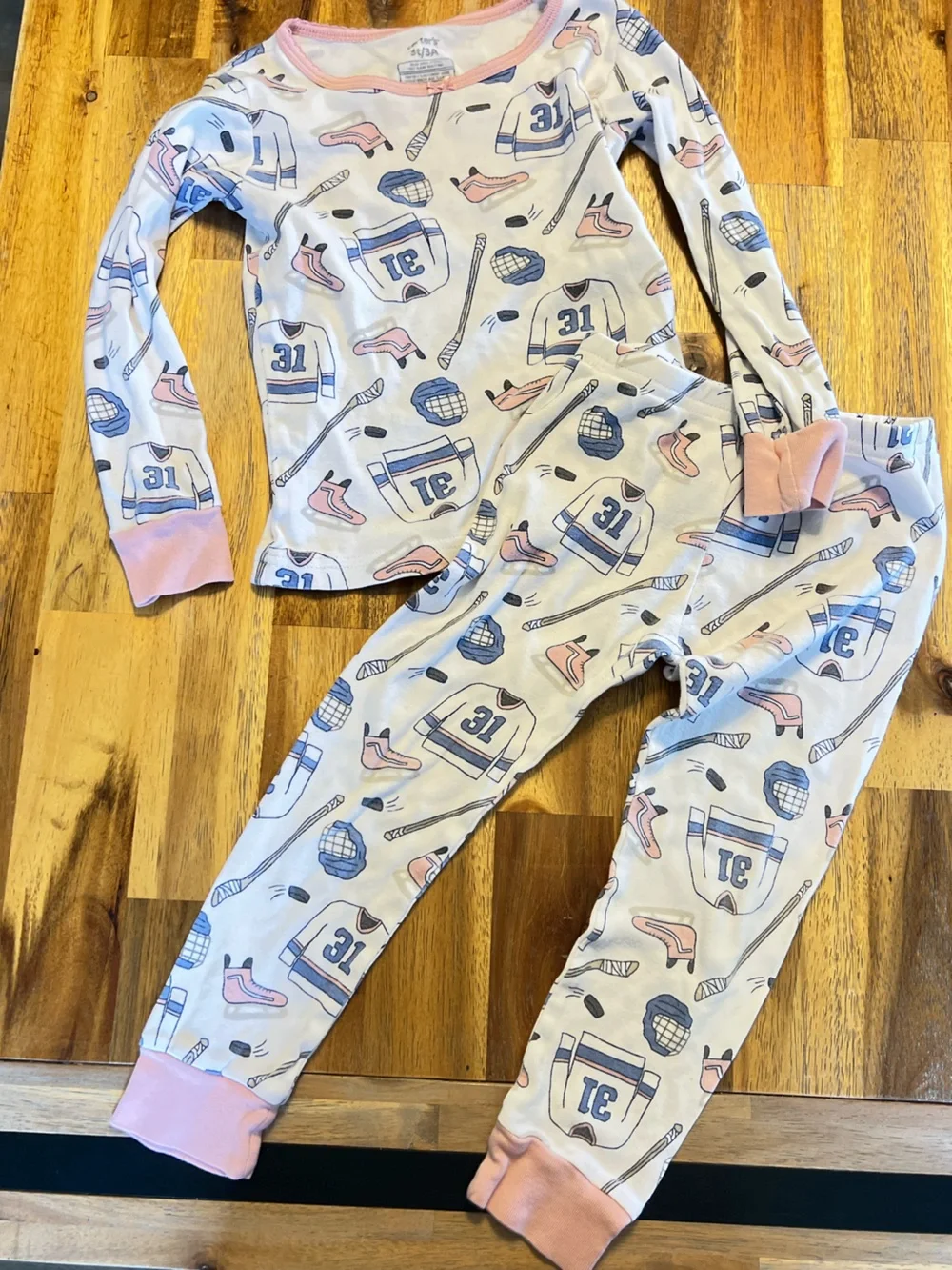 Carter's White Hockey Print Pajama Set with Pink & Blue Accents